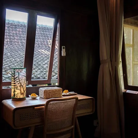 Tropical Traditional Indonesian Wooden Cottage In Ubud
